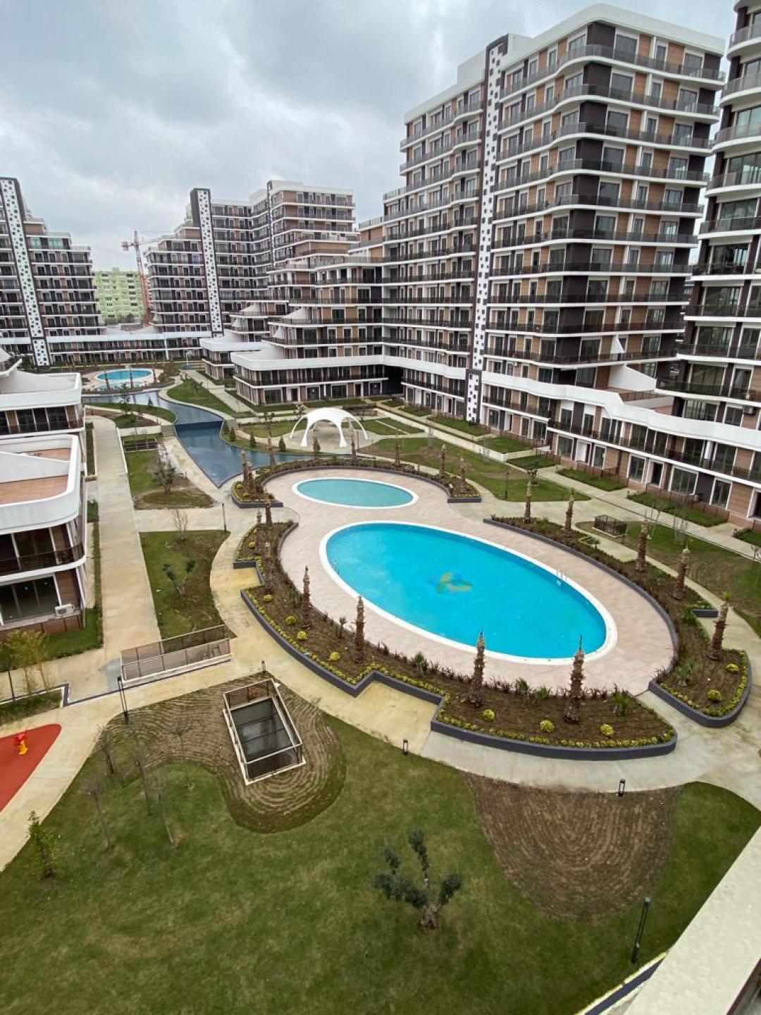 <p>The luxury apartments in a complex are located in the Beylikdüzü district of Istanbul. Beylikdüzü has all the amenities you may need for a comfortable life.</p><p>The apartments for sale in Beylikduzu are 2,5 km from West Istanbul Marina, 5 km from E-5 highway, 11 km from TEM highway, 20 km from Atatürk Airport, and 53 km from Istanbul Airport.</p><p>The modern apartments reside in a project built on a land area of 44.426 sqm. The project consists of 9 blocks, 160 apartments, and 77 commercial properties in total. The resort concept complex features abundant natural green areas, indoor and outdoor swimming pools, indoor and outdoor car parking areas, sunbathing areas, a shopping center, banks, cafes, restaurants, valet service, a fitness center, a sauna, a Turkish bath, a tennis court, a basketball court, a volleyball court, a football field, abundant recreation areas, generators, an irrigation system, card entry system, closed circuit video system, 24/7 security cameras, and security.</p><p>The apartments feature an open-plan kitchen or an apart kitchen, balconies, and en-suite bathrooms. Each apartment is equipped with a smart home system. The apartments have a steel entrance door, central heating, thermal insulation, fiber optic internet connection, wireless internet, cable TV, gas and fire alarm, satellite TV system, and central hot water.</p>