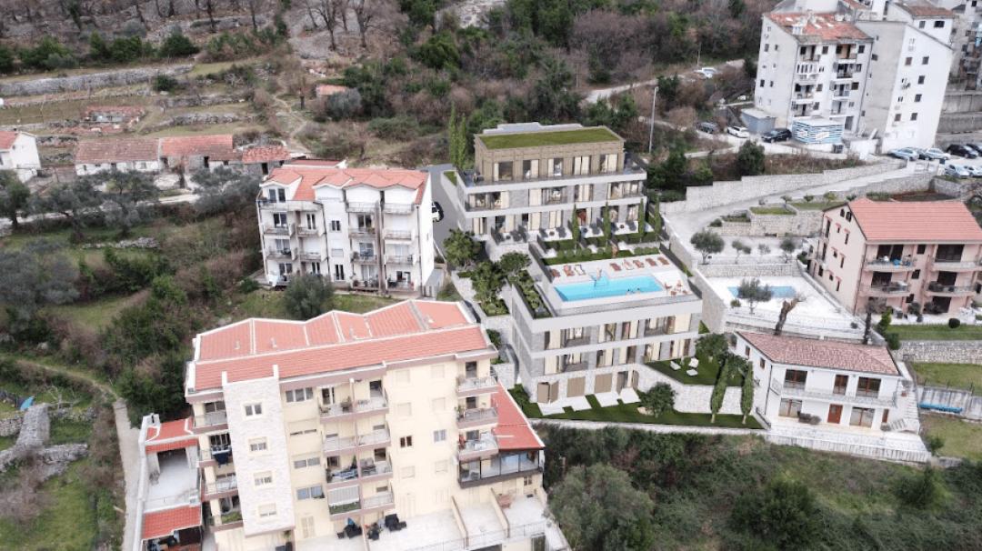 <p>Discover your dream home in the heart of Dobrota, Kotor – one of Montenegro's most sought-after coastal destinations. This exclusive project offers stylish residences with top-quality finishes, a private <strong>swimming pool</strong>, beautifully landscaped <strong>green areas</strong>, and secure <strong>parking</strong>.</p><p>Whether you're looking for a permanent residence, vacation retreat, or a smart investment, this development blends comfort, convenience, and Mediterranean charm – all just minutes from the Bay of Kotor and the historic Old Town.</p><p>✨ <strong>Key Features:</strong></p><p>Private <strong>swimming pool</strong> for residents</p><p>Landscaped <strong>green area</strong> perfect for relaxation</p><p>Designated <strong>private parking</strong></p><p>Prime location in <strong>Dobrota, Kotor</strong></p><p>Close to the sea, restaurants, and amenities</p><p>Live the Montenegrin lifestyle you've always imagined.</p>