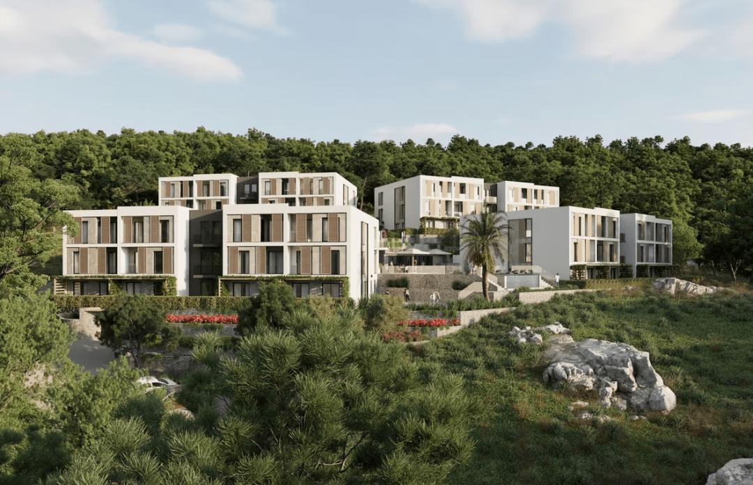 <p>Surrounded by lush greenery and offering breathtaking sea views, this exclusive residential project is located in Kotor — one of Montenegro’s most sought-after destinations and a UNESCO World Heritage site. Thoughtfully designed in harmony with nature and its surroundings, the development consists of four elevator-equipped buildings with a total of 108 spacious apartments.</p><p>Offering year-round comfort, the project features generously sized units — above the local average — with various layouts including studio, 1-bedroom, and 2-bedroom options. Homes come with balconies or private garden spaces to suit different lifestyle preferences.</p><p>Residents benefit from a wide range of amenities such as a swimming pool, gym, restaurant, co-working area, children’s playground, and both open and closed parking. Additionally, the project provides essential services including 24/7 security, reception, concierge, and professional property management.</p><p>Ideally located just 5 minutes from the Kotor Port and historic Old Town, 7 minutes from the luxury marina Porto Montenegro in Tivat, and only 3 minutes from Tivat International Airport, this project presents a unique opportunity for both investment and high-quality living.</p>