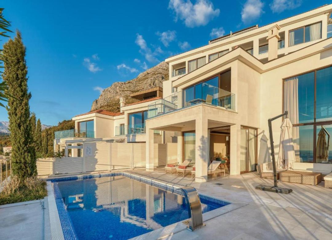 <p>The villa project is centrally located in the heart of the Budva Riviera, in the secluded inlet of Rezevici.<br>The branded luxury villas are a part of the only five-star resort in Montenegro that offers an exclusive selection of 3- and 4- bedroom villas, each carefully designed and graced with 100% panoramic sea views, private pools, multiple shaded terraces, and generous, decorative gardens. Its exclusive location allows residents easy access to the entire Montenegrin coastline and authentic towns, historic cultural sites and magnificent encounters with Montenegro’s beauty.</p><p>Tivat Airport (30 km); Podgorica Airport (55 km); Dubrovnik Airport, Croatia (82 km)</p><p>Spa, Gym, Private Beach, Private Pool and garden are facilities of the project.</p><p>&nbsp;</p><p>Also you can secure your investment and get guaranteed rental income with professional rental management.<br>&nbsp;</p>